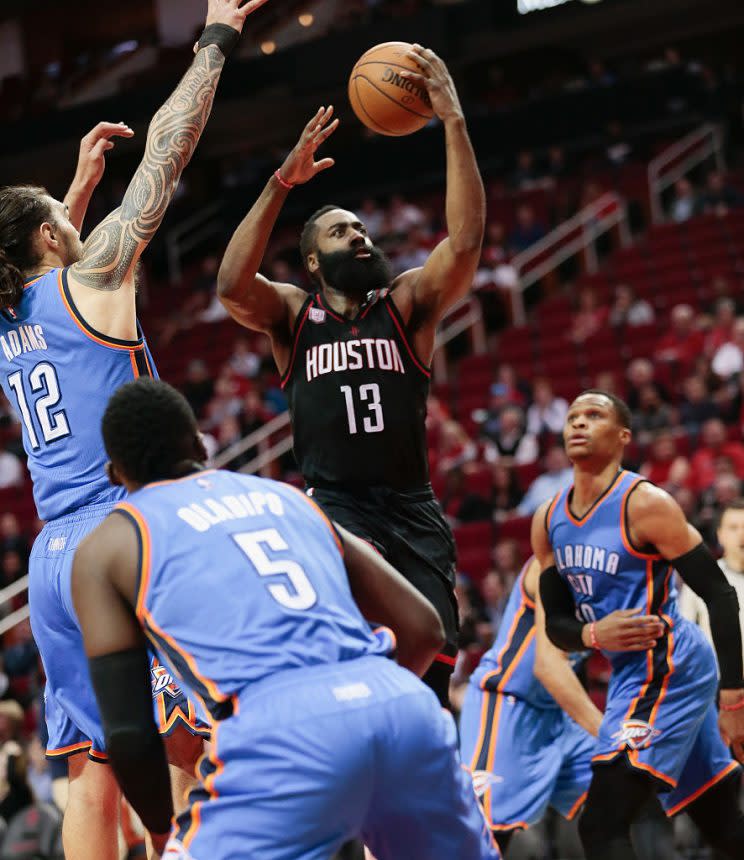 James Harden rises above the Oklahoma City Thunder. (Bob Levey/Getty Images)