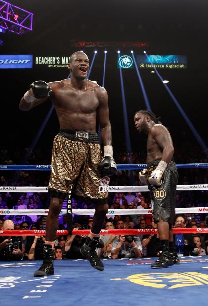 Deontay Wilder, left, celebrates winning the WBC heavyweight title against Bermane Stiverne in January. (Getty)