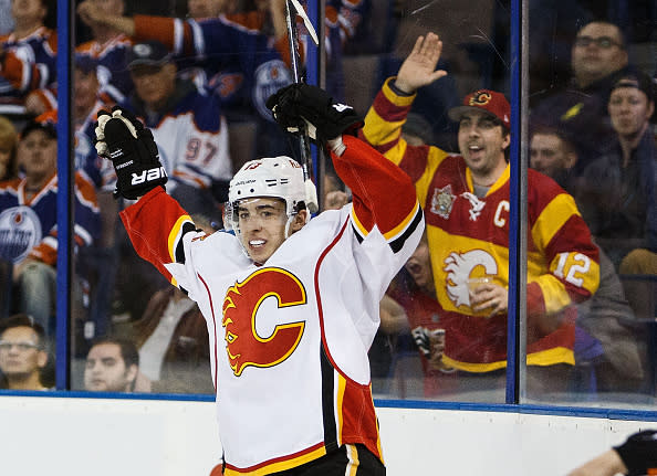 EDMONTON, AB - APRIL 2: Johnny Gaudreau #13 of the Calgary Flames celebrates a goal against the Edmonton Oilers on April 2, 2016 at Rexall Place in Edmonton, Alberta, Canada. (Photo by Codie McLachlan/Getty Images)