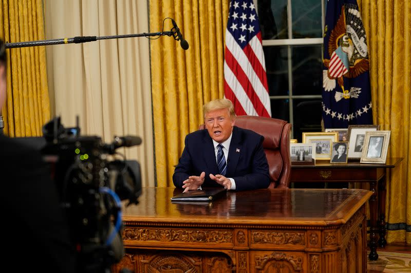 U.S. President Trump speaks about the U.S response to the COVID-19 coronavirus pandemic during an address to the nation from the Oval Office of the White House