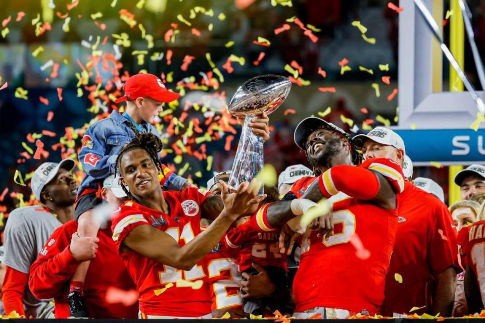 Kansas City Chiefs wide receiver Demarcus Robinson (11) holds the Vince Lombardi Trophy after winning Super Bowl 54 against the San Francisco 49ers at Hard Rock Stadium on Sunday, February 2, 2020 in Miami Gardens, Florida.