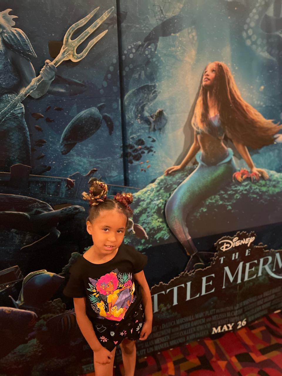 Jackie Rucker, director of diversity, equity and inclusion at Teachers Credit Union, took her granddaughter, Marcie Merkel, 5,  to see a morning showing of "The Little Mermaid" live-action film at Movies 14 in Mishawaka the day it opened, May 26, 2023. It was Marcie's first time seeing a film in a theater.