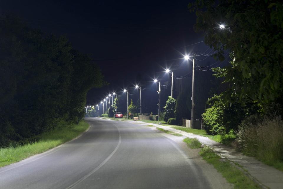 The standard candle principle: all of these lights have the same ‘intrinsic brightness’, but the more distant ones appear dimmer. Shutterstock