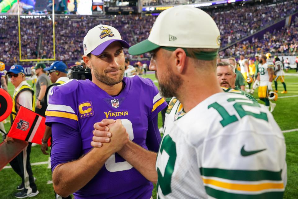 Could Minnesota's Kirk Cousins (8) join Aaron Rodgers as a former NFC North quarterback in 2024?