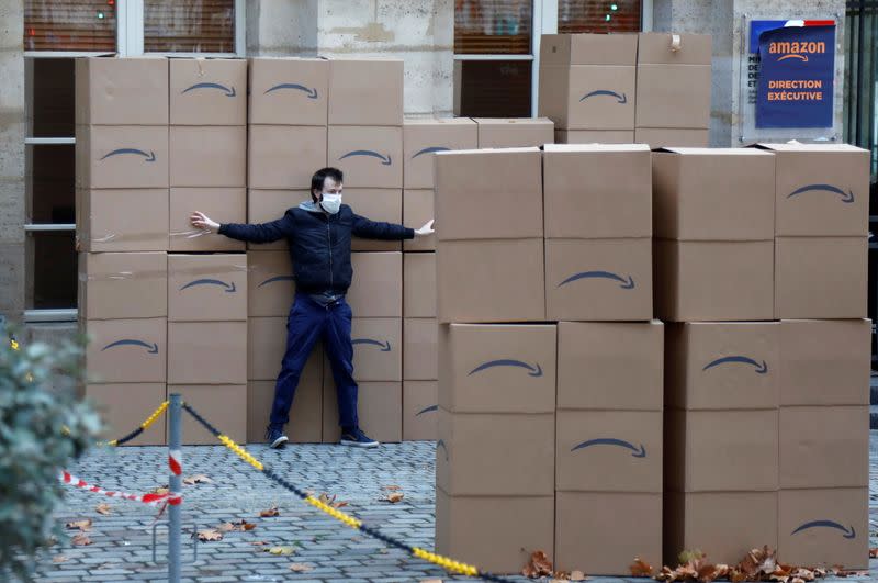 French activists demonstrate against Amazon in Paris