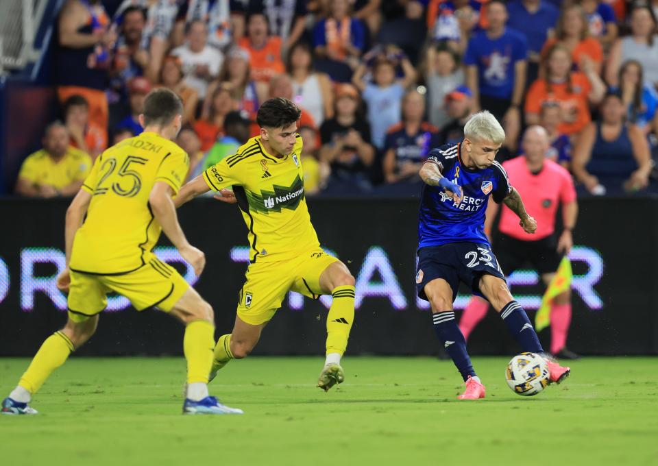 Sep 14, 2024; Cincinnati, Ohio, USA; Columbus Crew forward Max Arftsen (27) battles FC Cincinnati forward Luca Orellano (23) for control of a ball during the first half
at TQL Stadium. Mandatory Credit: Katie Stratman-Imagn Images