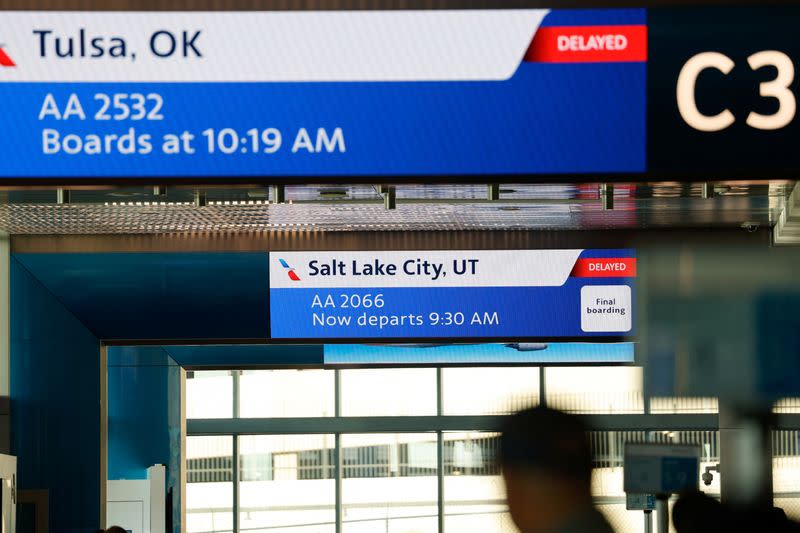 Screens display flight information in Dallas Fort Worth Airport