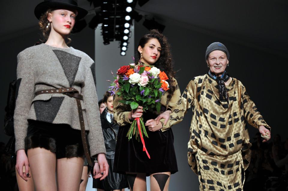 Dame Vivienne Westwood, right, at the Vivienne Westwood presentation during London Fashion Week Autumn/ Winter 2014 on Sunday, Feb. 16, 2014 at Somerset House in London. (Photo by Richard Chambury/Invision/AP Images)