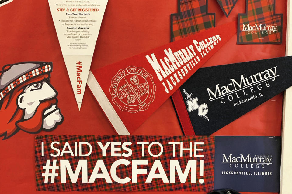 This January 2020 photo provided by Jamie Bolker shows pennants and other MacMurray College paraphanelia in Jacksonville, Ill. When Bolker started teaching composition at MacMurray College in January 2020, she felt like she'd won the lottery. In March, though, she delivered a grim Twitter announcement: “Welp. MacMurray College is permanently closing ... They were already on the edge and coronavirus was the final nail.” (Jamie Bolker via AP)