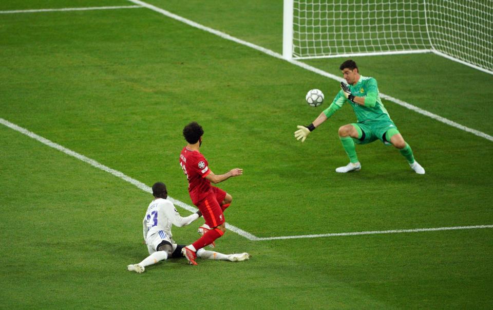 Real Madrid Goalkeeper Thibaut Courtois saves from Liverpool's Mohamed Salah during the UEFA Champions League Final at the Stade de France - Peter Byrne/PA Wire