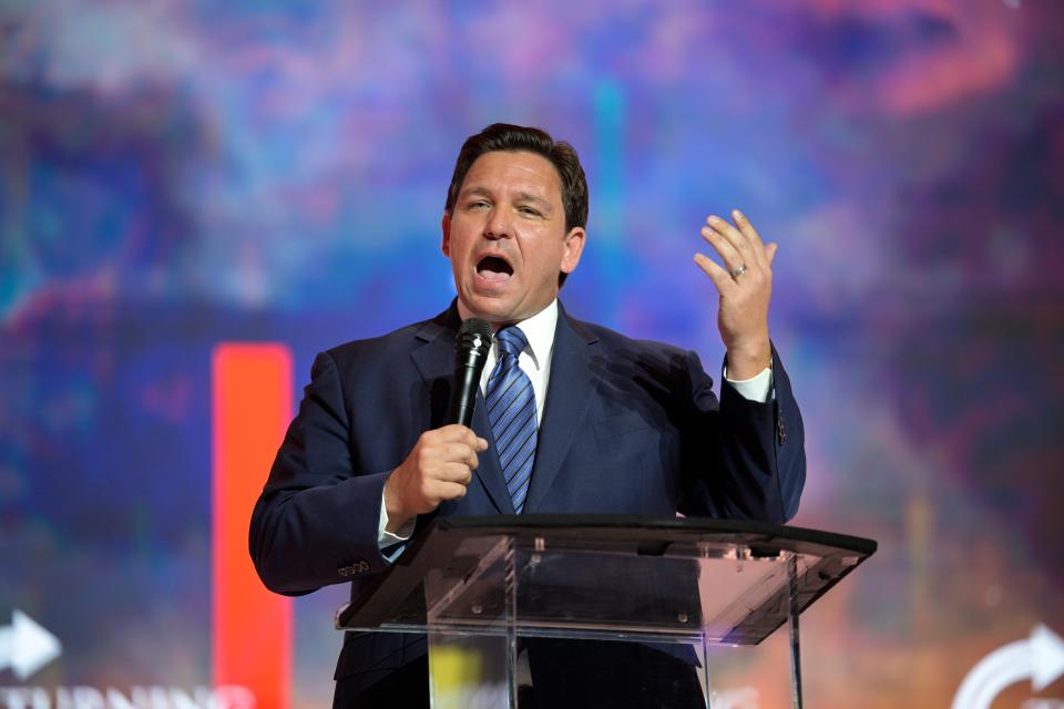 Florida Gov. Ron DeSantis addresses attendees during the Turning Point USA Student Action Summit on July 22 in Tampa. DeSantis on Tuesday teased legislation aimed at recruiting to teaching jobs retired law-enforcement officers, emergency-medical technicians, paramedics and firefighters who have bachelor’s degrees.