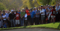 ABU DHABI, UNITED ARAB EMIRATES - JANUARY 29: Tiger Woods of the USA plays his second shot on the par 5, 18th hole during the final round of the Abu Dhabi HSBC Championship at the Abu Dhabi Golf Club on January 29, 2012 in Abu Dhabi, United Arab Emirates. (Photo by David Cannon/Getty Images)