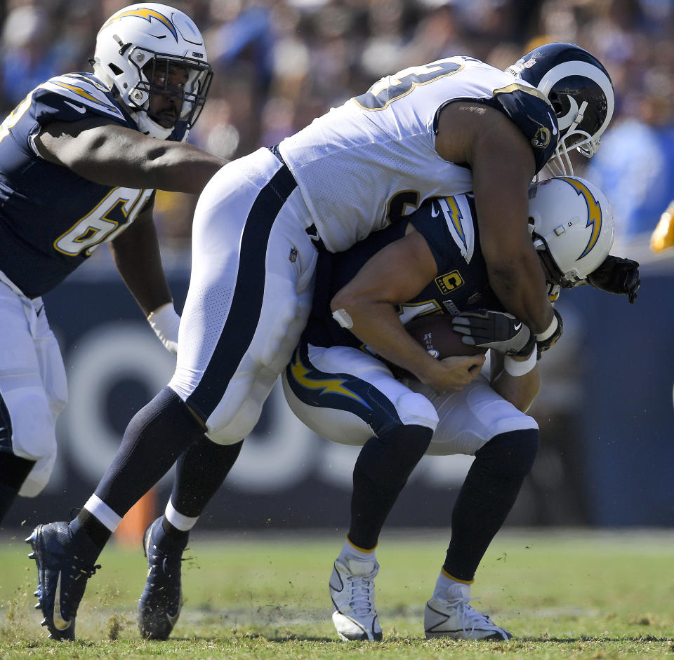 Los Angeles Rams defensive tackle Ndamukong Suh sacks Los Angeles Chargers quarterback Philip Rivers during the second half in an NFL football game Sunday, Sept. 23, 2018, in Los Angeles. (AP Photo/Mark J. Terrill)
