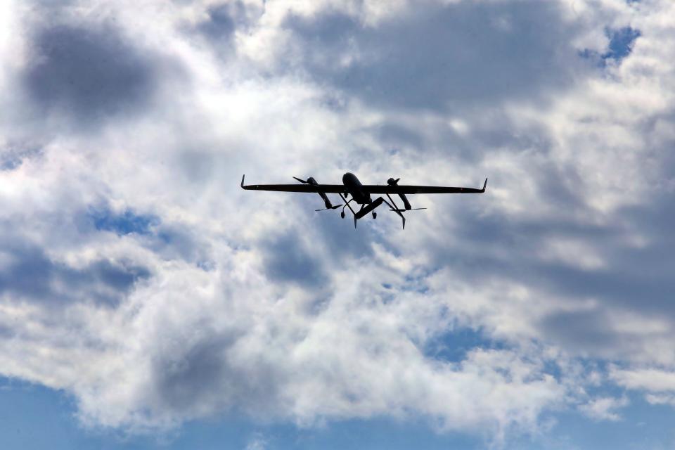 A drone is pictured in the sky