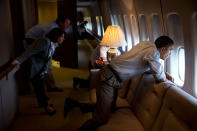<p>“The President and members of the White House staff look out the window of Air Force One to view tornado damage over Moore, Oklahoma on May 26, 2013. After landing at Tinker Air Base, the President did a walking tour of the damage and met with those affected.” (Pete Souza/The White House) </p>