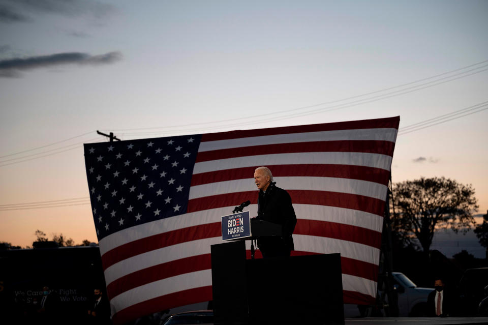 Biden campaigns at a drive-in rally in Detroit on Oct. 16<span class="copyright">Jim Watson—AFP/Getty Images</span>