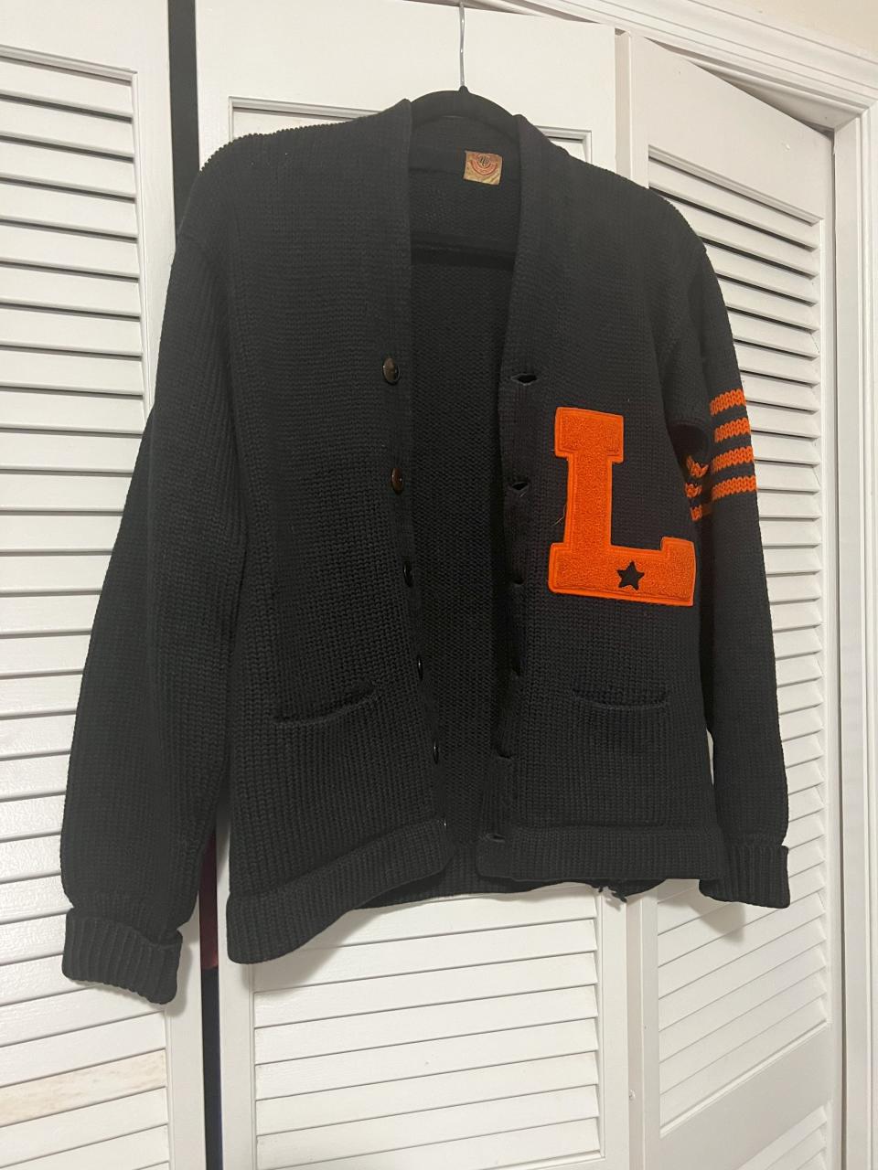 The 1942 letterman sweater worn by David Sudderth from when he was a running back for Leesburg High's football team.