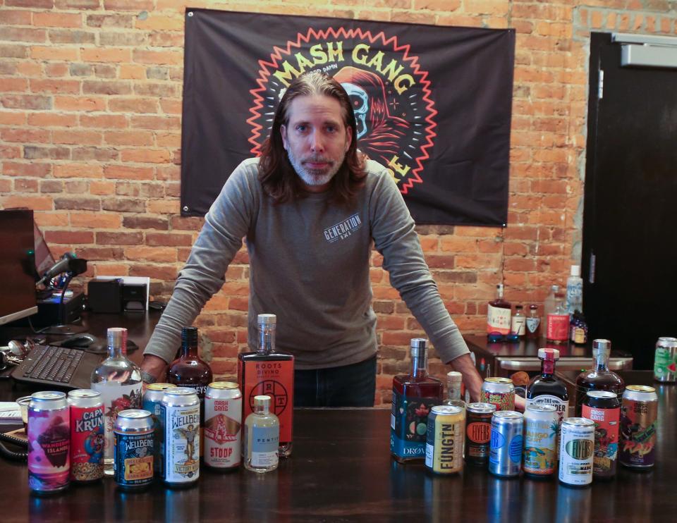 Rob Theodorow, owner of Generation NA, poses for a photo as he prepares his shop for "Dry January," on Wednesday, Dec. 28, 2022, in Lafayette, Ind.
