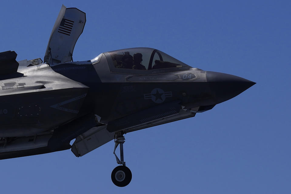 F-35 aircraft prepared for landing on the U.K.'s aircraft carrier HMS Queen Elizabeth in the Mediterranean Sea on Sunday, June 20, 2021. The British Royal Navy commanders say the U.K.'s newest aircraft carrier HMS Queen Elizabeth is helping to take on the "lion's share" of operations against the Islamic State group in Iraq as Russian warplanes get an up-close look at the cutting-edge F-35 jet in a "cat-and-mouse" game with British and U.S. pilots. (AP Photo/Petros Karadjias)