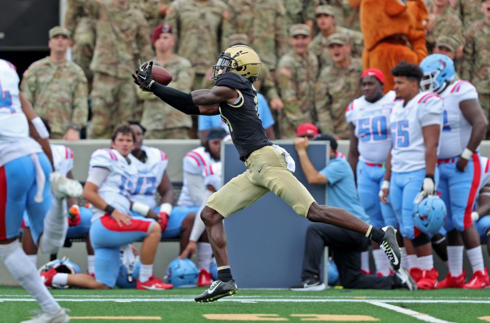 Army wide receiver Isiah Alston (11) catches a pass from quarterback Bryson Daily that went for a touchdown during the first half against Delaware State at Michie Stadium.