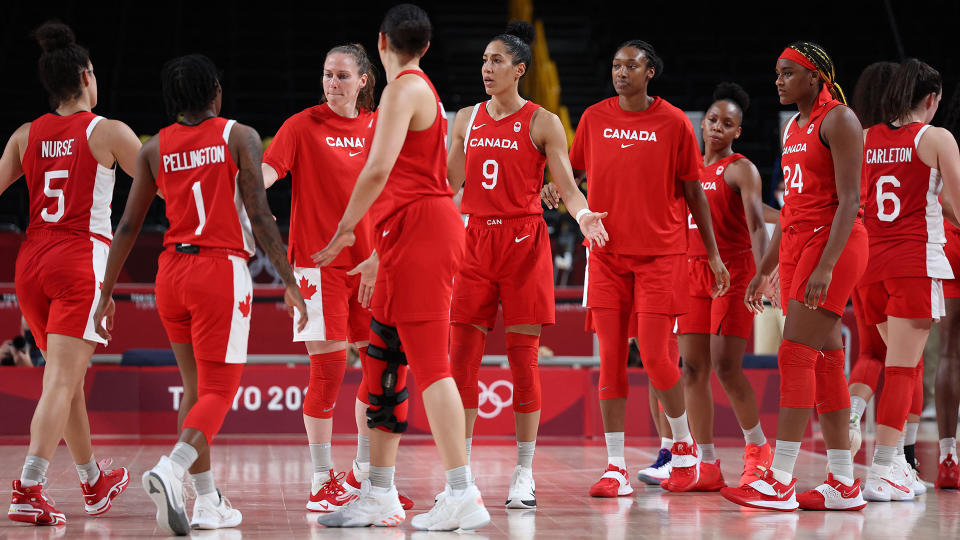 Canada's players react after they defeat in the women's preliminary round group A basketball match between Serbia and Canada during the Tokyo 2020 Olympic Games at the Saitama Super Arena in Saitama on July 26, 2021. (Photo by Thomas COEX / AFP) (Photo by THOMAS COEX/AFP via Getty Images)