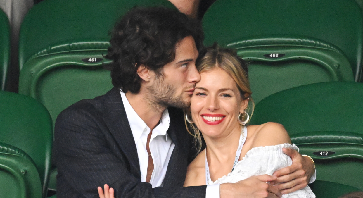 Sienna Miller attended Wimbledon with her boyfriend Oli Green. (Getty Images)