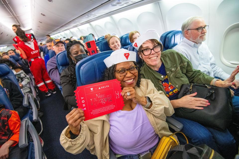 Delta Air Lines ane Virgin Voyages come together to give away a pair of tickets to each passenger on a flight to San Juan, Puerto Rico from Atlanta, Georgia at Hartsfield Jackson international Airport on Thursday February 29, 2024. (Chris Rank/ Rank Studios)