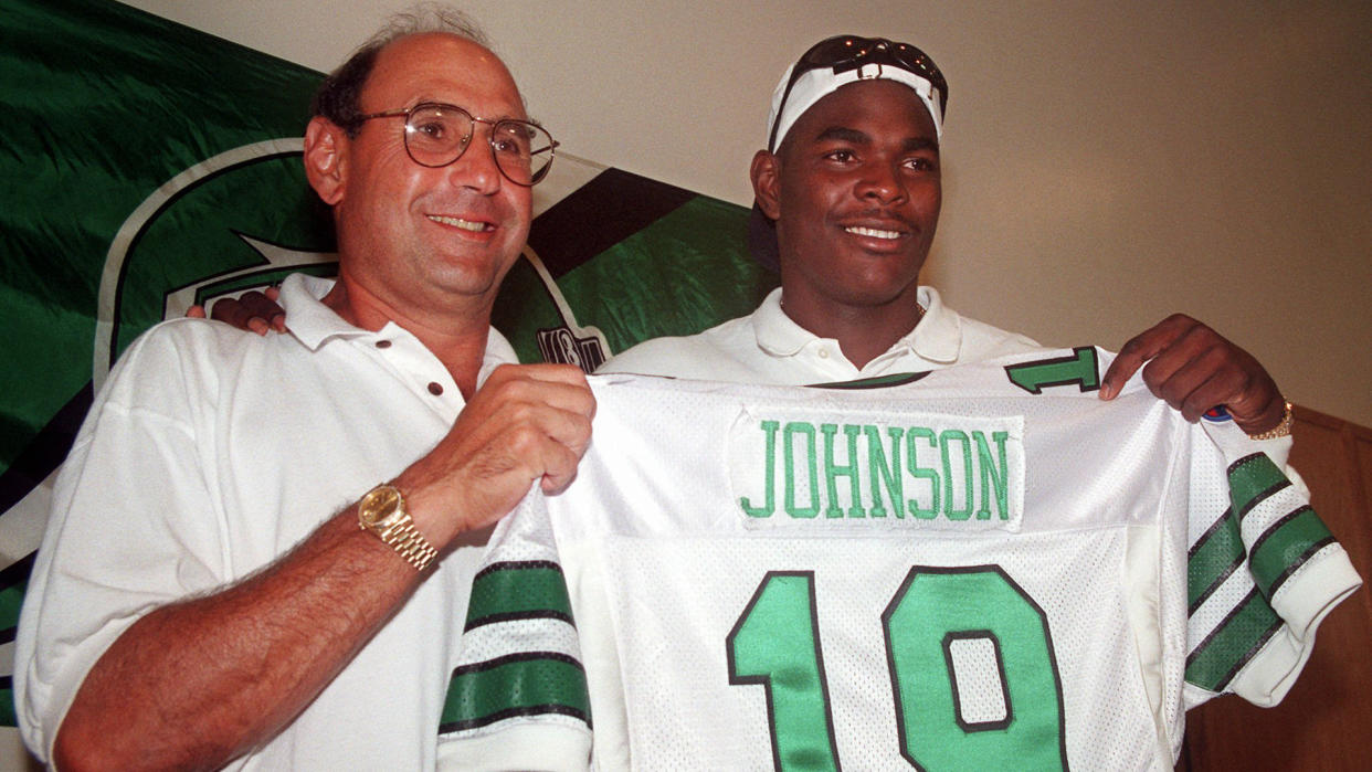 Mandatory Credit: Photo by Bruce Cotler/AP/Shutterstock (6032303a)KOTITE JOHNSON Keyshawn Johnson, right, holds up a New York Jets jersey at a news conference with New York Jets coach Rich Kotite in Hempstead, N.