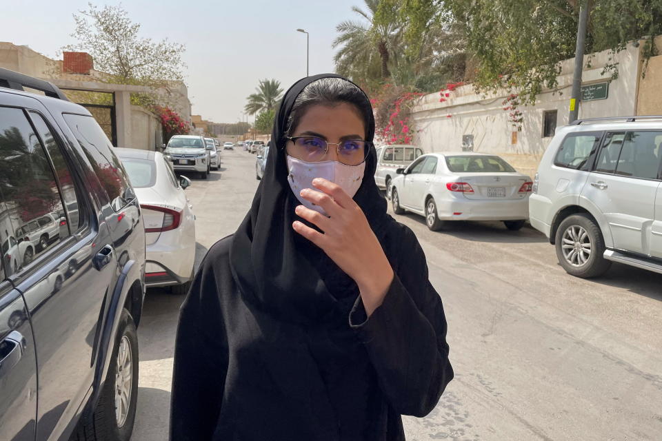 Saudi activist Loujain Al-Hathloul makes her way to appear at a special criminal court for an appeals hearing, in Riyadh, Saudi Arabia March 10, 2021. (Ahmed Yosri/Reuters)