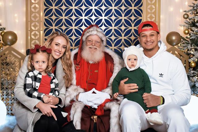 <p>Brittany Mahomes/Instagram</p> Patrick and Brittany Mahomes with their kids and Santa