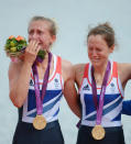 Katherine Copeland and Sophie Hosking of Great Britain celebrate with their gold medals during the medal ceremony for the Lightweight Women's Double Sculls Final on Day 8 of the London 2012 Olympic Games at Eton Dorney on August 4, 2012 in Windsor, England. (Photo by Harry How/Getty Images)