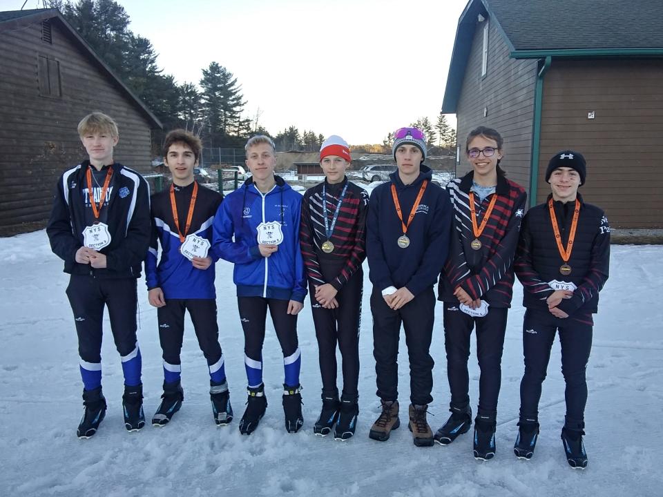 Posed together are members of the Section 9 boys Nordic skiing team that will compete in the 2023 state tournament. From left: Charlie  Price, Elijah Nicol and Jordan Marwin of Wallkill, and New Paltz teammates Matei Jirka, Beckett Evans, Henry Wheeler and Nathaniel Johnson.