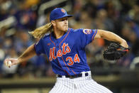 New York Mets' Noah Syndergaard pitches during the first inning in the second baseball game of a doubleheader against the Miami Marlins Tuesday, Sept. 28, 2021, in New York. (AP Photo/Frank Franklin II)