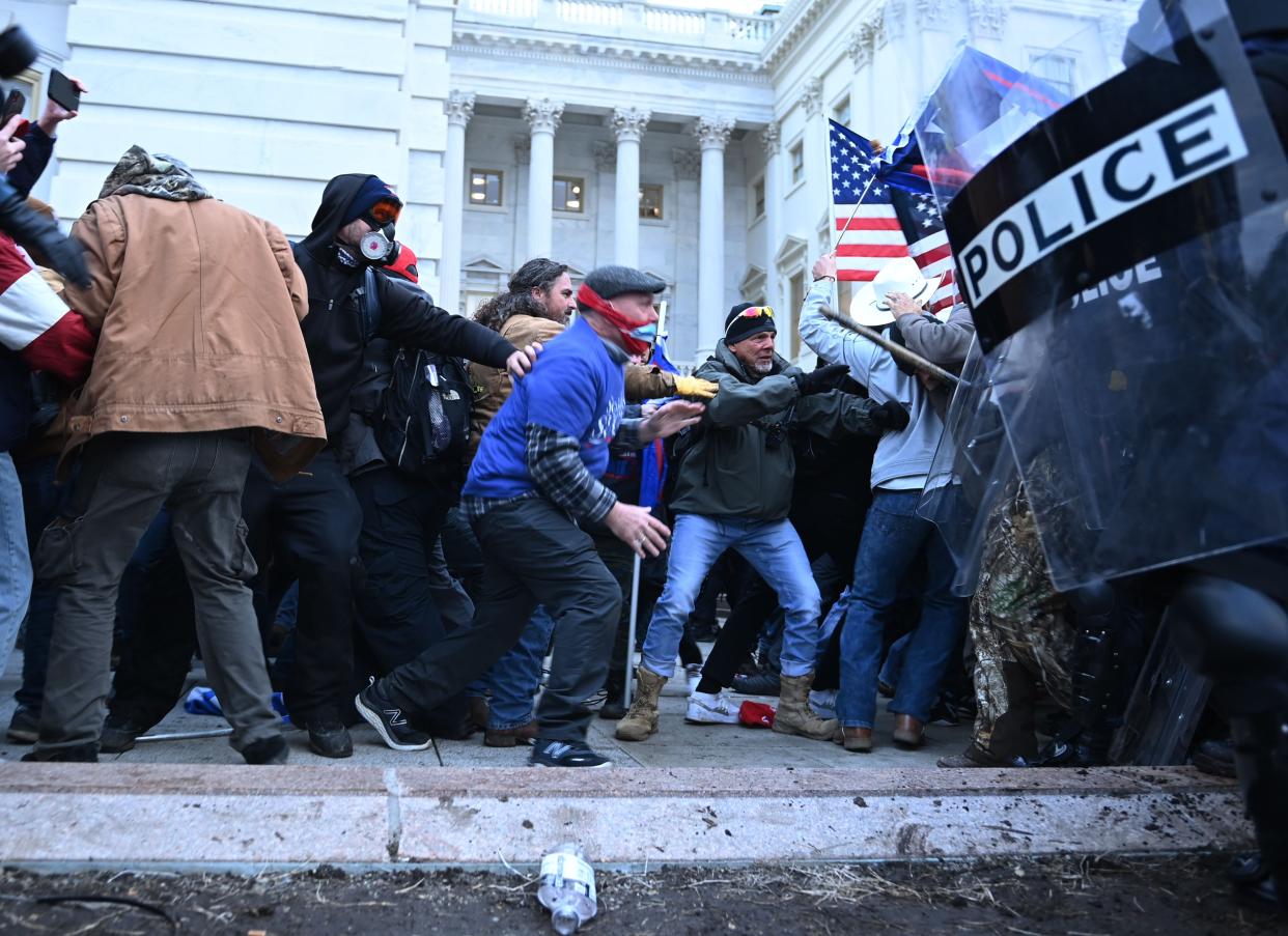 <p>Man arrested near Capitol on Wednesday had ‘homemade napalm’ in pickup truck</p> ( BRENDAN SMIALOWSKI/AFP via Getty Images)