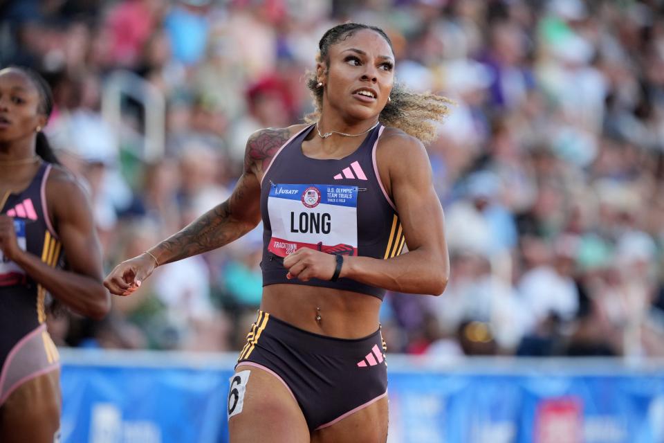 McKenzie Long wins a women's 200m semifinal in 22.03 during the US Olympic track and field trials.