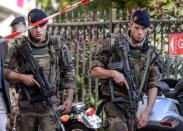 <p>Military officers set up a security perimeter near the site where six soldiers of the anti-terrorism Sentinelle operation were hit by a car in Levallois-Perret, near Paris, France, Aug. 9, 2017. (Photo: Christophe Petit Tesson/EPA/REX/Shutterstock) </p>