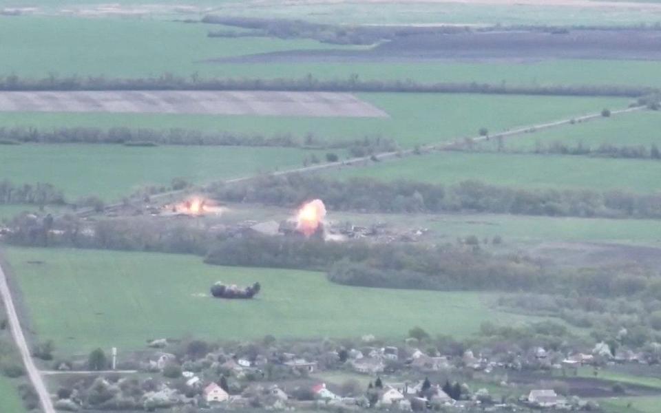 A still image shows a military strike purportedly carried out against a Russian armoured military convoy in a location given as near Izium, Ukraine in this screen grab obtained from a social media video released by National Guard Of Ukraine April 30, 2022. Courtesy of National Guard Of Ukraine/via REUTERS THIS IMAGE HAS BEEN SUPPLIED BY A THIRD PARTY. MANDATORY CREDIT. REUTERS COULD NOT INDEPENDENTLY VERIFY THE FOOTAGE. REFILE - CLARIFYING INFORMATION - National Guard Of Ukraine/via REUTERS