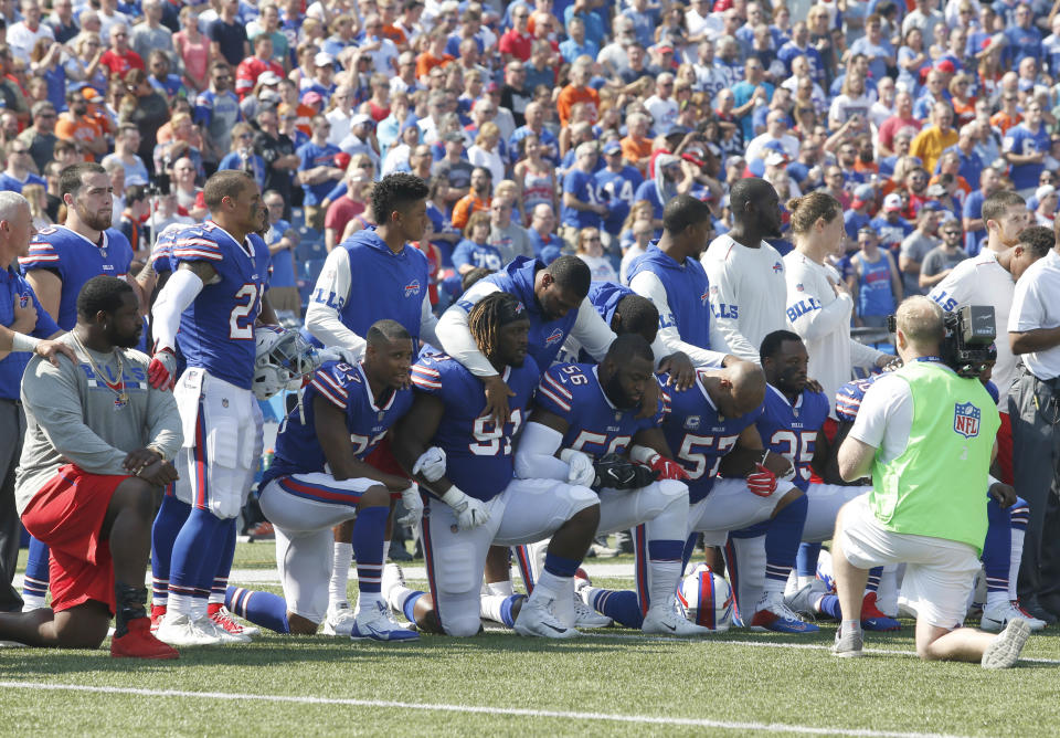 Buffalo Bills players kneel in protest during the national anthem before a game in New York against the Denver Broncos on Sunday. (Photo: Timothy T. Ludwig/USA Today Sports via Reuters)