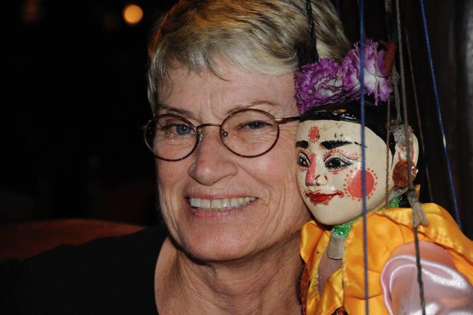 Georgia Tasker with a puppet in Myanmar.