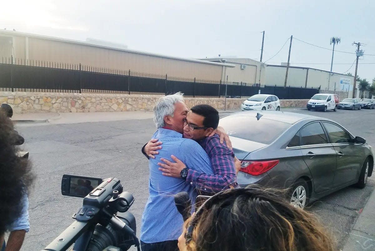 Emilio Gutiérrez Soto and son Oscar reunite after being released from detention on July 26, 2018. Father and son fled Mexico in 2008 after Gutiérrez Soto said his reporting on the Mexican military led to death threats. His asylum request was approved this month.