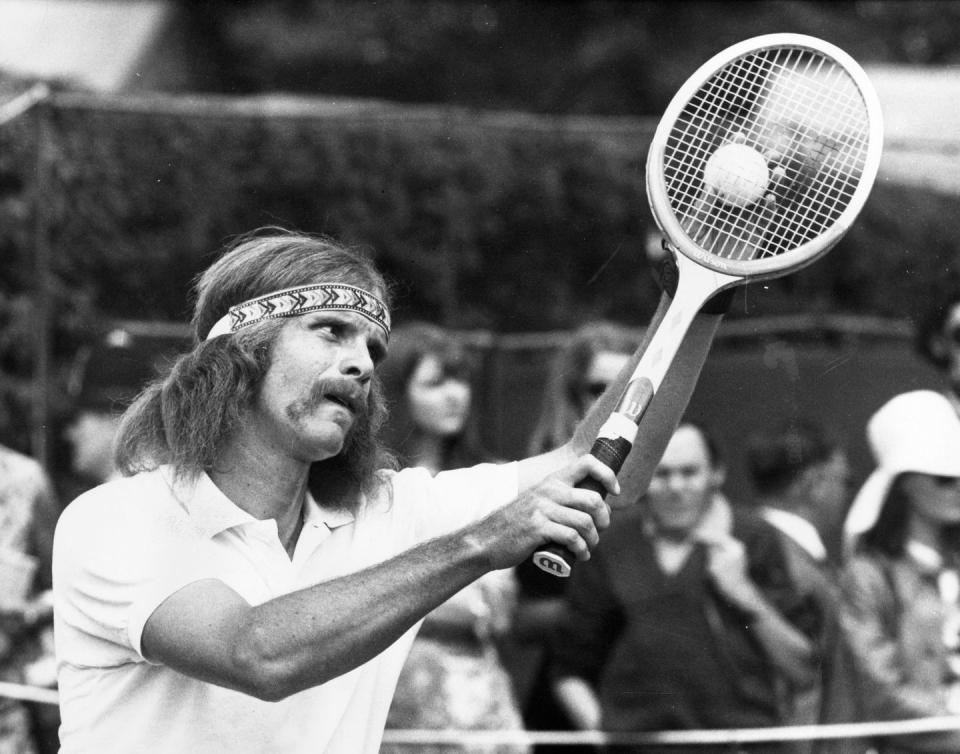 <p>South African tennis player Ray Moore preparing to serve at the Wimbledon Tennis Championships on June 22, 1971.</p>