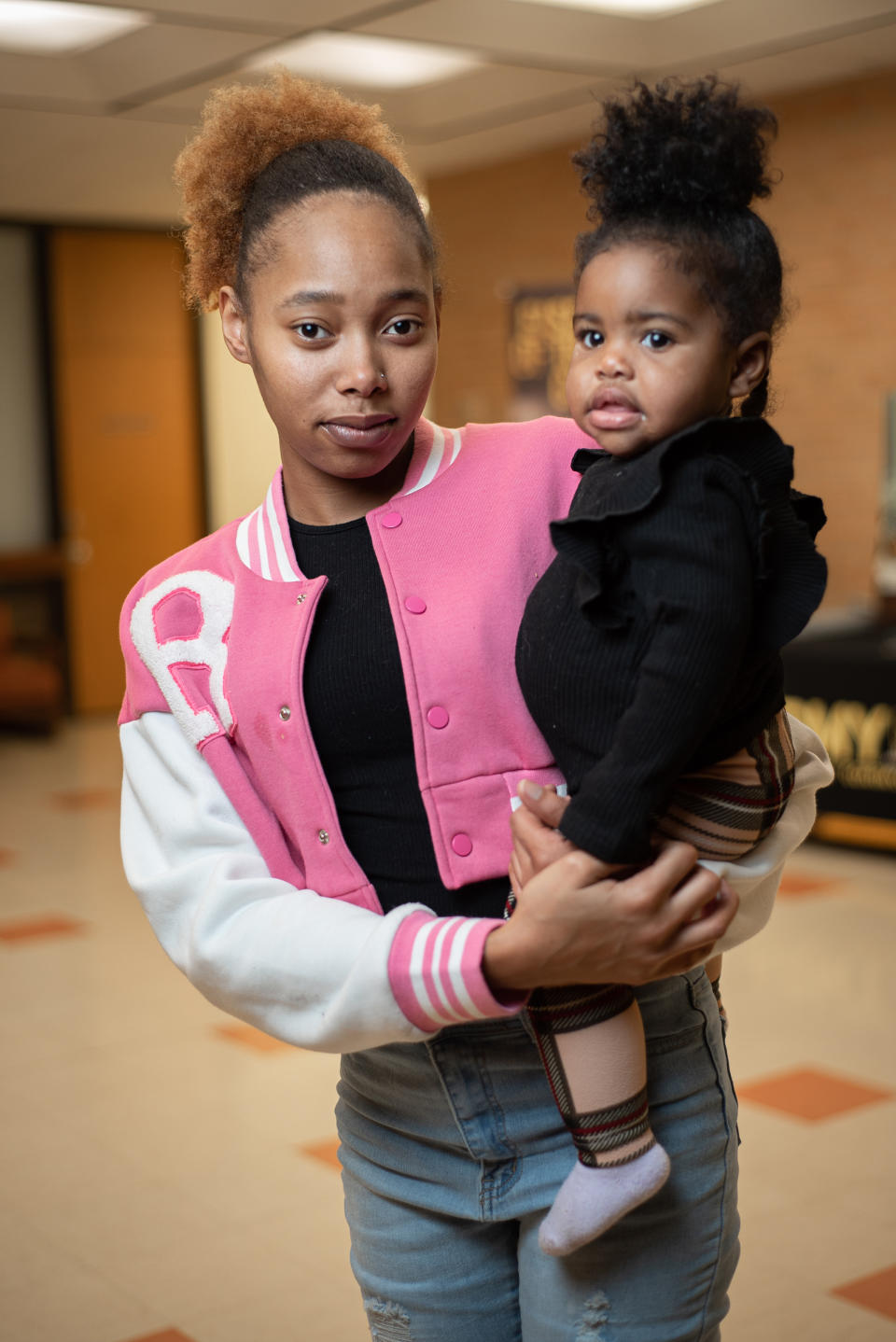 Kayla Wheeler with her daughter, Chase at Mississippi Valley State University in Itta Bena, Miss., on Nov. 16, 2022. (Timothy Ivy for NBC News)