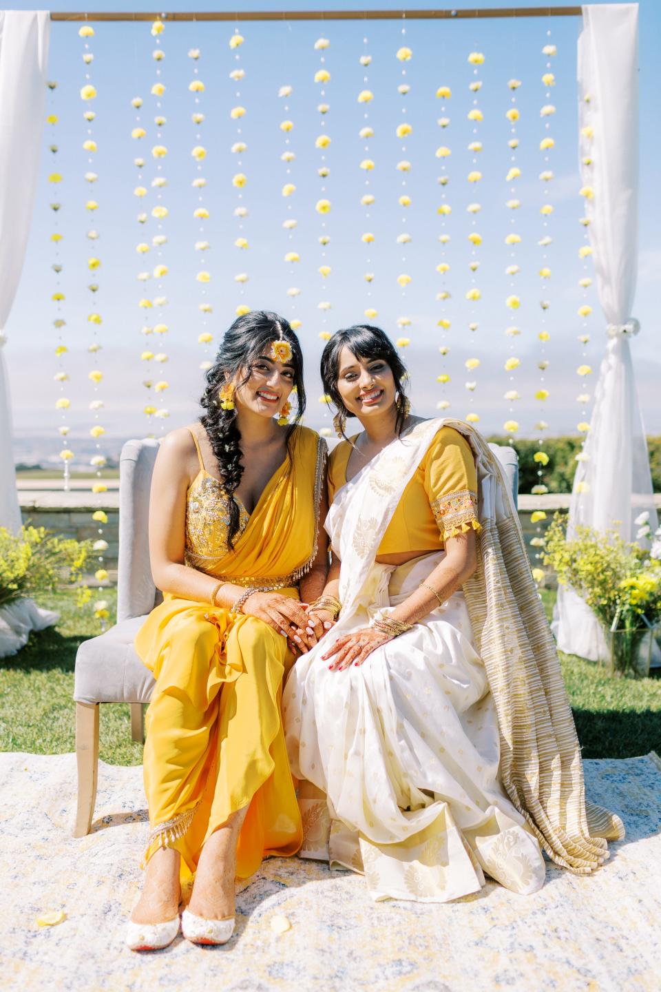 Deepa (right) and Gauri (left) decided to wear outfits at the Haldi ceremony that honored their Indian cultures.