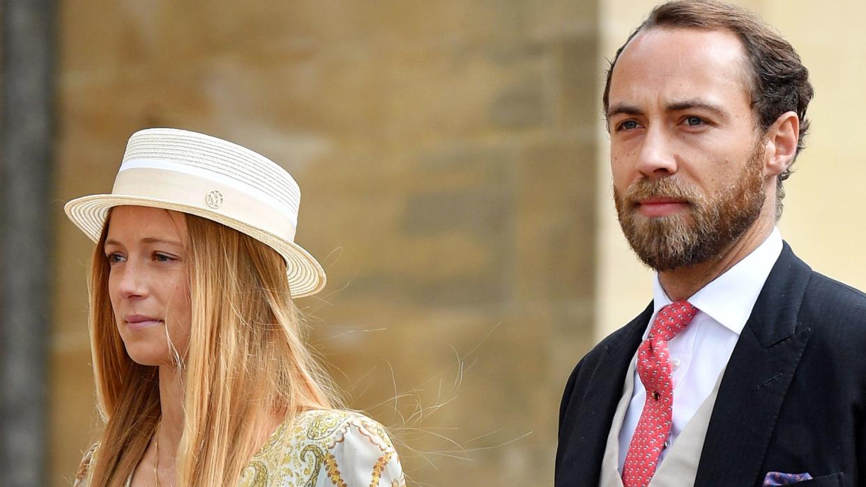 Alizee Thevenet in a hat and James Middleton in a suit