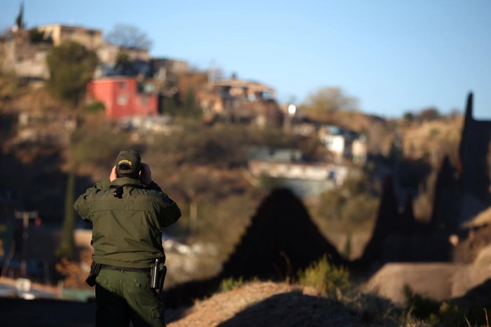 U.S. Border Patrol Agent David Ruiz patrols the U.S. border with Mexico in Nogales, Ariz., in January. (Lucy Nicholson/Reuters)