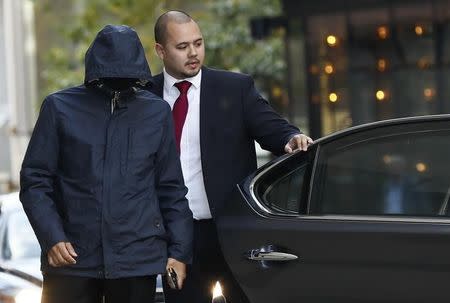 Undercover reporter Mazher Mahmood (L) arrives at the Old Bailey courthouse in London, Britain October 4, 2016. REUTERS/Stefan Wermuth