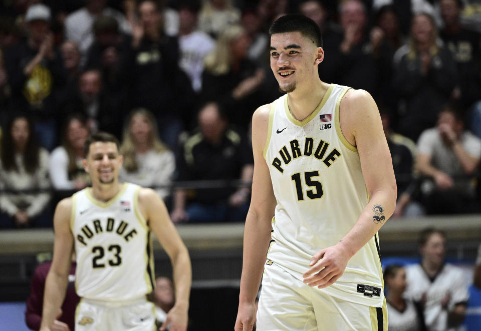 Purdue center Zach Edey (15) smiles while walking toward the bench during the second half of the team's NCAA college basketball game against Eastern Kentucky, Friday, Dec. 29, 2023, in West Lafayette, Ind. (AP Photo/Marc Lebryk)
