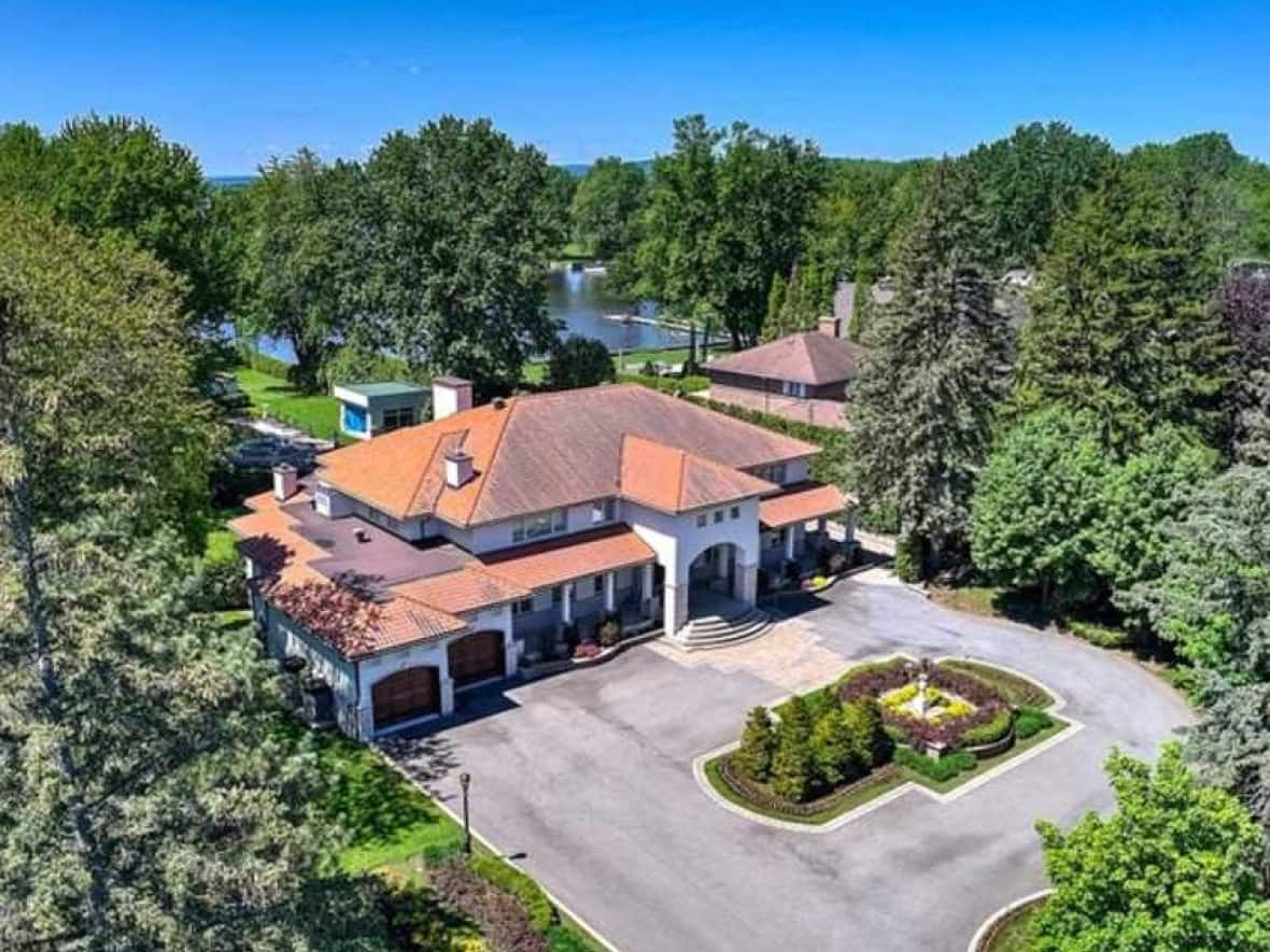 Haitian senator Rony Celestin's $4.25 million home in Laval-sur-le-Lac, Quebec.  (Realtor listing - image credit)