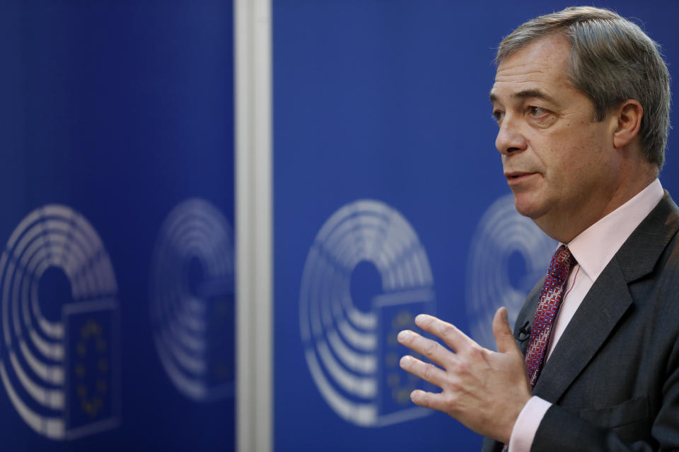 Nigel Farage, the leader of the Brexit Party, answers reporters at the European parliament Wednesday, Jan.15, 2020 in Strasbourg, eastern France. Nigel Farage, the self-declared "pantomime villain" of Brexit, is leaving his favorite theater — the European Union's parliament in Strasbourg — this week with a sense of mission accomplished. (AP Photo/Jean-Francois Badias)