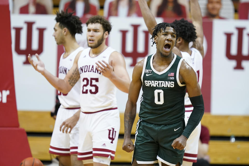 Michigan State's Aaron Henry (0) reacts after hitting a shot and getting fouled during the second half of an NCAA college basketball game against Indiana, Saturday, Feb. 20, 2021, in Bloomington, Ind. Michigan State won 78-71. (AP Photo/Darron Cummings)